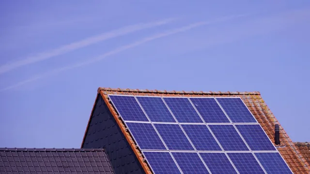Solar panel maintenance on a Durham, NC roof